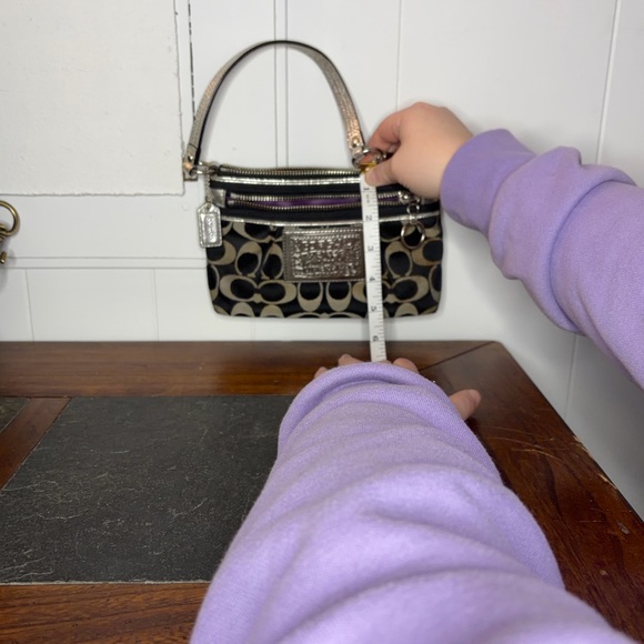 Coach Poppy Black and Tan Signature Clutch
